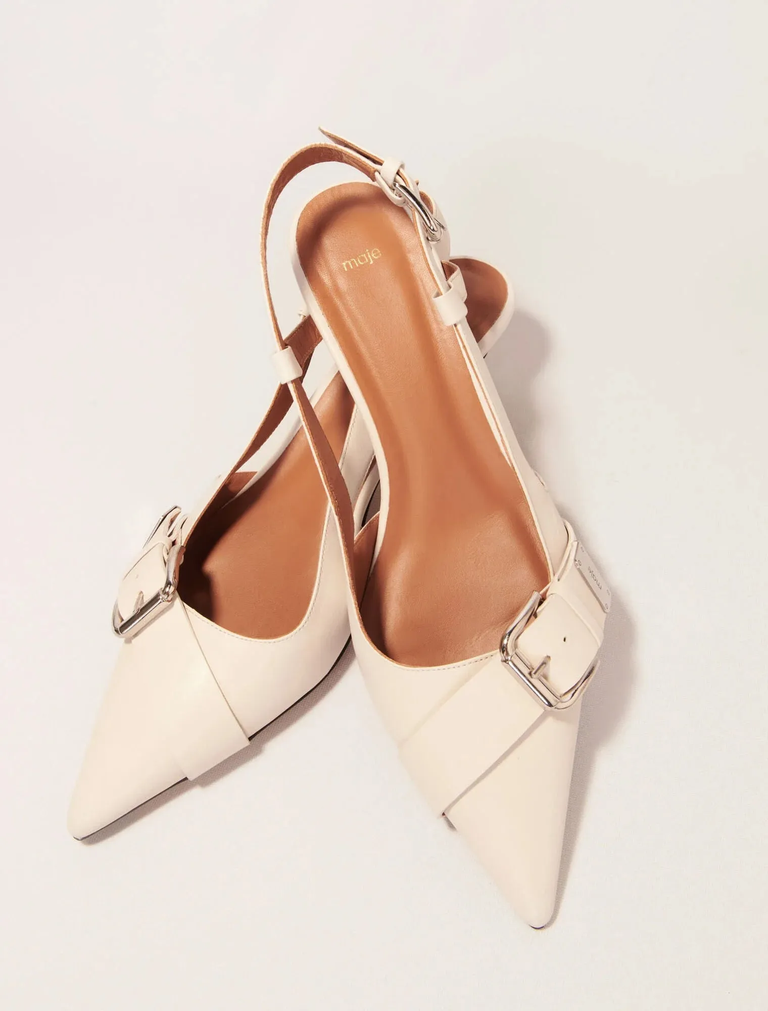 Double buckle slingback pump