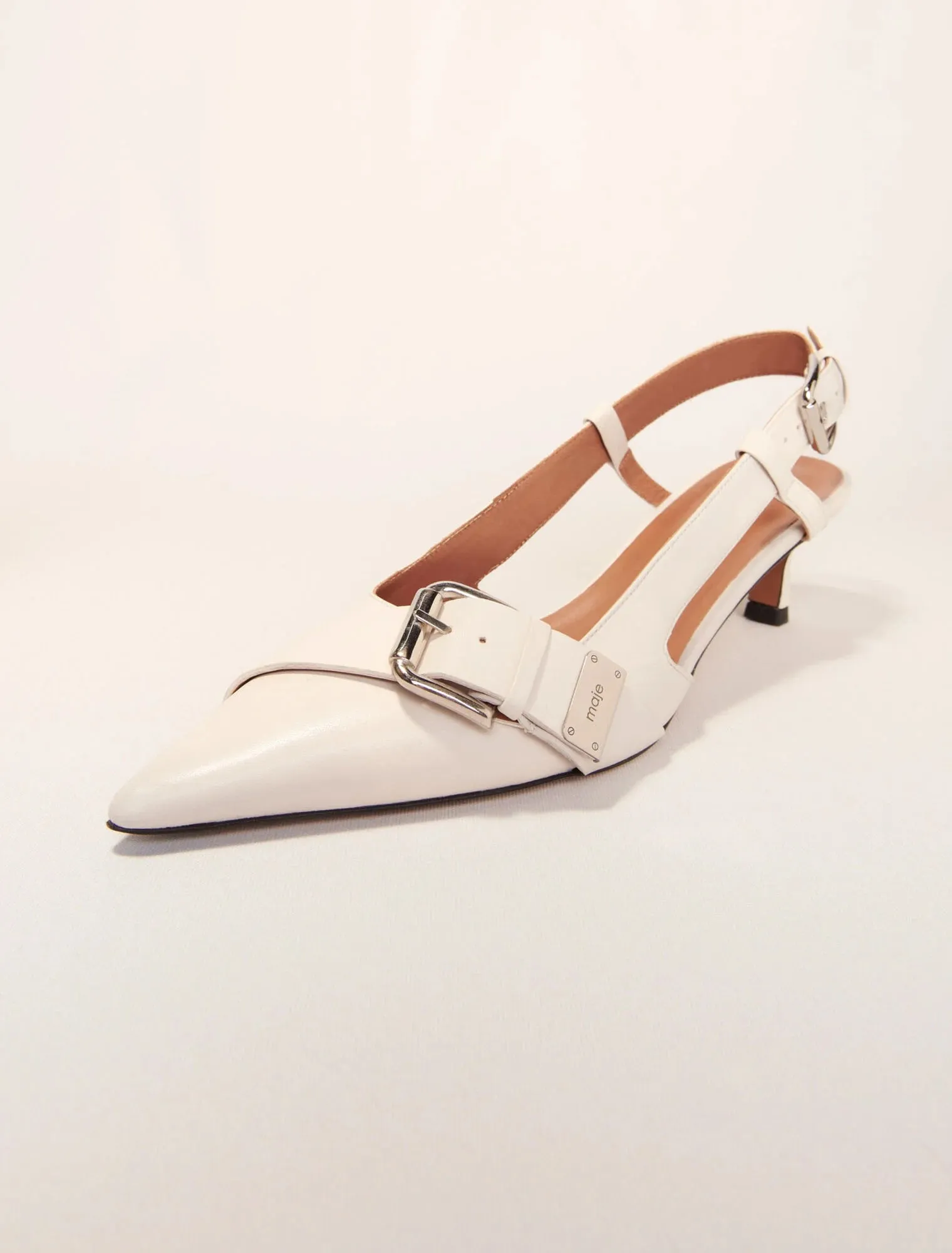Double buckle slingback pump